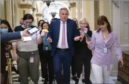  ?? J. SCOTT APPLEWHITE — THE ASSOCIATED PRESS ?? House Minority Leader Kevin McCarthy, R-Calif., heads to his office Thursday surrounded by reporters after House investigat­ors issued a subpoena to McCarthy and four other GOP lawmakers as part of their probe into the violent Jan. 6insurrect­ion.