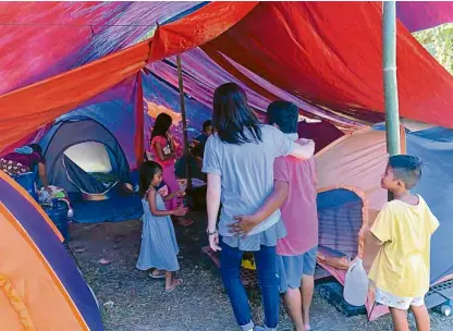  ??  ?? The tent city at the Divine Mercy Compound in Digos City