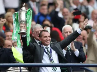  ??  ?? Rodgers celebrates after Celtic's win (Getty)