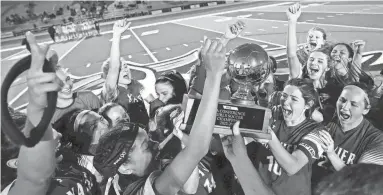  ?? PATRICK BREEN/THE REPUBLIC ?? Xavier Prep celebrates a 6A championsh­ip win over Perry at Dobson High School.