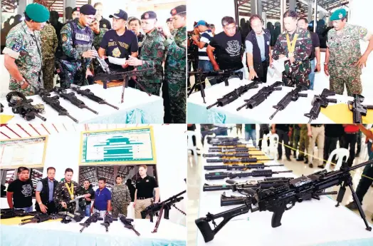  ?? (PNA FOTOS) ?? SAF WEAPONS. Sixteen firearms recovered from the fallen SAF commandos during the fatal encounter in Mamasapano, Maguindana­o on Jan. 25, were returned to government authoritie­s. AFP Chief of Staff Gen. Gregorio Pio Catapang joined the turnover along...