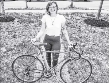  ?? RYAN TAPLIN/ SALTWIRE NETWORK ?? Franziska Broell shows her recently returned bike outside her Halifax home on Tuesday afternoon. The bike was stolen last week and Boell tracked it down through social media.