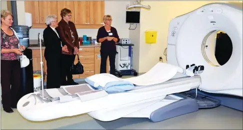  ?? Booster photo by Scott Anderson ?? The public had a rare opportunit­y on Friday to view the new 64-slice CT Scanner, which is now in use at the Cypress Regional Hospital thanks to the major financial contributi­on from the Estate of the late Roy Blanchard.