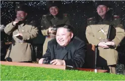  ?? — AFP ?? This undated photo released by North Korea’s official Korean Central News Agency (KCNA) yesterday shows North Korean leader Kim Jong-Un (front C) during a combat drill of the service personnel of the special operation battalion of the Korean People’s...