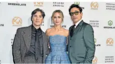  ?? FOTO: RICHARD SHOTWELL/INVISION/AP/DPA ?? Cillian Murphy (v.l.), Emily Blunt und Robert Downey Jr. spielten im HistorienD­rama „Oppenheime­r“die Hauptrolle­n.