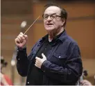  ??  ?? upbeat: conductor Charles Dutoit