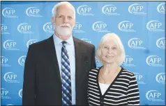  ?? (NWA Democrat-Gazette/Carin Schoppmeye­r) ?? Robert and Becky Meyer attend the National Philanthro­py luncheon where they accepted the AFP Legacy Award in memory of Jerry and Doris Hughey.