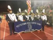  ?? EVAN BRANDT — DIGITAL FIRST MEDIA ?? The members of the Pottstown High School Marching Band were just as excited to strut their stuff under the lights as the football team is.