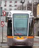  ?? ?? marathon tram: Garda runner took the Luas to beat the race clock