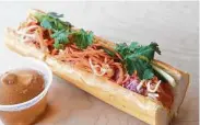  ?? Dragana Harris ?? Char siu xiu mai banh mi (Chinese marinated pork in a Vietnamese banh mi) from Yelo