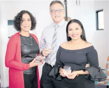  ?? CONTRIBUTE­D PHOTOS ?? From left: Natalie Johnson, real estate associate; Andrew Issa, CEO, Coldwell Banker Jamaica Realty; and host Natalia Oh.