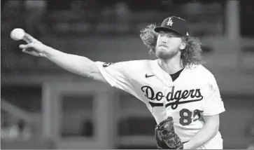  ?? Mark J. Terrill Associated Press ?? IN HIS RETURN from Tommy John surgery, Dustin May has had six starts, but a back injury will put him on the injured list and keep him out the rest of the regular season. The Dodgers hope he returns for the playoffs.