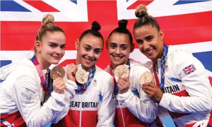  ??  ?? Team GB’s Alice Kinsella, Jennifer Gadirova, Jessica Gadirova and Amelie Morgan pose with their bronze medals. Photograph: Martin Rickett/PA