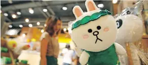  ??  ?? Merchandis­e at the Line Village store in Bangkok includes characters such as Cony the rabbit.