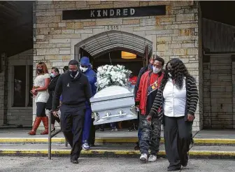  ?? Jon Shapley / Staff photograph­er ?? Friends and family of Asia Jynaé Foster carry her casket following her funeral service on Saturday. The 22-year-old Black transgende­r woman was found shot to death on Nov. 20.