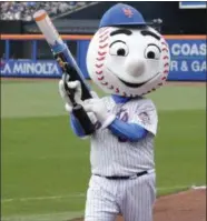  ?? FRANK FRANKLIN II — THE ASSOCIATED PRESS ?? Mr Met distribute­s T-shirts to fans during the sixth inning ofa baseball game against the Milwaukee Brewers Thursday in New York.