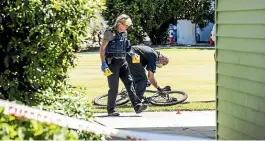  ?? BRADEN FASTIER/ STUFF ?? Police search the NelsonHine­moa Croquet Club grounds after two men were stabbed there on Tuesday night. Both men are in Nelson Hospital in a stable condition.