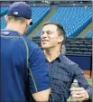  ?? Chris O’Meara Associated Press ?? ANDREW FRIEDMAN, right, chats with Tampa Bay third baseman Evan Longoria.