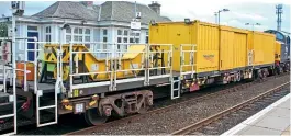  ??  ?? FCAs are also used in infrastruc­ture trains, loaded with various modules which can include equipment containers and flat modules for carrying engineerin­g equipment. No. 610303 was photograph­ed at Nairn on August 26, 2020 working as a crane match wagon, complete with jib loaded on a flat ISO module.