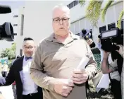  ?? LYNNE SLADKY AP ?? Scot Peterson, assigned resource officer at Marjory Stoneman Douglas, leaves the Broward County Jail after posting bond on June 6, 2019.