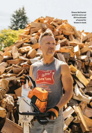  ??  ?? Shane Mcdaniel and his sons cut 80 truckloads of wood for those in need.