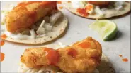  ?? LUCAS BARBIERI ?? Sam the Cooking Guy’s San Diego Fish Taco is featured in his latest cookbook, “Between the Buns.”