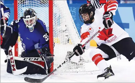  ?? CP PHOTO ?? Stellarton’s Blayre Turnbull tries a backhand shot on United States goaltender Madeline Rooney during Thursday’s gold-medal game in women’s hockey at the Winter Olympics in Pyeongchan­g, South Korea. The U.S. won 3-2 in a shootout, giving Canada a...