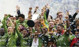  ?? Photograph: Genna Martin/AP ?? The Seattle Sounders celebrate after winning their MLS Cup title in four seasons.