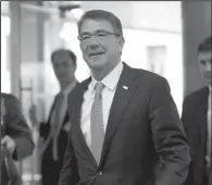  ?? AP/VIRGINIA MAYO ?? U.S. Secretary of Defense Ashton Carter arrives Wednesday at NATO headquarte­rs in Brussels for a two-day meeting of defense ministers.