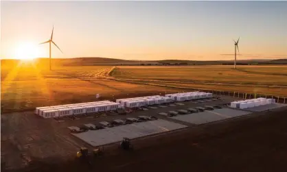  ?? ?? South Australia’s giant battery at Hornsdale Power Reserve in Adelaide. Tesla argues any new charges on storage providers for drawing power from the grid would lead to consumers paying more for electricit­y.