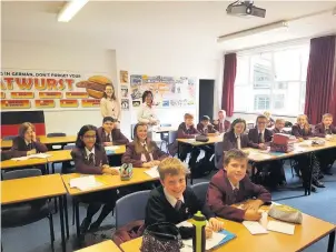  ??  ?? Pupils at Tytheringt­on School learning Mandarin