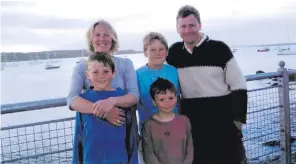  ??  ?? Annemarie with her husband Michael Meade and their children, from left, Conor, Patrick and Rory. This was taken during a holiday in Ireland when the boys were younger
