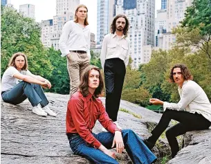  ?? ?? ●●Blossoms band members sprang into action when told their hotel rooms were not ready
