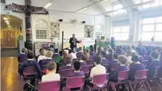  ??  ?? Damien Moore MP addresses Linaker pupils