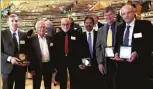  ??  ?? RM Higgs and Englert (second and third from left) awarding the 2013 EPS High-Energy and Particle Physics Prize to its recipients for the discovery of the Higgs boson