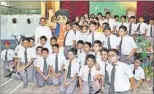  ?? HT PHOTO ?? Students of St Francis’ College with cartoon character ‘Kisna’.