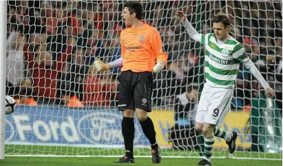  ??  ?? “Sometimes I still pinch myself to see if it was real.” Kelly keeps out Gary Twigg’s ( right) penalty during the 2010 FAI Cup final. Pic: Sportsfile.