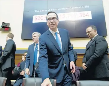  ?? Jose Luis Magana Associated Press ?? “I’M NOT OVERLY concerned about the market volatility,” Treasury Secretary Steven T. Mnuchin said Tuesday. Stocks gyrated amid concerns about rising wages, federal deficits, inflation and interest rates.