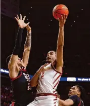  ?? David Purdy/Getty Images ?? Robert Jones and Iowa State won Saturday to set up a battle with UH on Monday for first place in the Big 12.