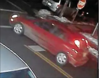  ?? SUBMITTED PHOTO ?? Police are searching for this Ford Focus, which investigat­ors believe was used in a hitand-run fatality.