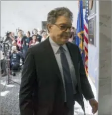  ?? J. SCOTT APPLEWHITE — THE ASSOCIATED PRESS ?? Sen. Al Franken, D-Minn., returns to his office after talking to the media on Capitol Hill in Washington, Monday.