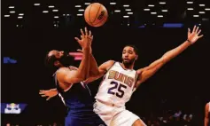  ?? Jessie Alcheh / Associated Press ?? The Nets’ James Harden draws a foul against Mikal Bridges of the Suns in the first half. Phoenix never trailed in winning 113-107.