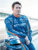  ?? Photo / NZME ?? Scott Dixon was appointed a Member of the New Zealand Order of Merit in 2009 and was promoted to Companion of the New Zealand Order of Merit in 2019.