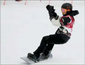  ?? THE ASSOCIATED PRESS ?? Sebastien Toutant, of Canada, reacts after his jump during the men’s Big Air snowboard competitio­n at the 2018 Winter Olympics in Pyeongchan­g, South Korea, Saturday.