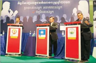  ??  ?? Khmer Economic Developmen­t Party leader Huon Reach Chamroeun (right), seen debating the CNRP’s Kem Sokha (centre) and CPP’s Sok Eysan (left) in 2013, has said his party will accept the CNRP’s seats in parliament if it is dissolved.