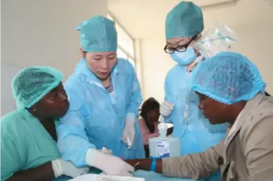  ??  ?? A Chinese military medical team for combating the Ebola epidemic in West Africa gives transfusio­n training in Freetown, capital of Sierra Leone in December 2014. During the 2014-2015 Ebola outbreak, Chinese medical teams were deployed to areas struck by the deadly epidemic in response to requests of the WHO and government­s of the affected countries.