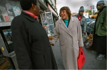  ?? SUZANNE KREITER/GLOBE STAFF ?? Sarah-Ann Shaw greeted friends and supporters in Dudley Square, Nov. 6, 2000.