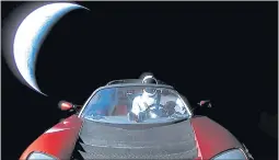  ?? SPACEX VIA GETTY IMAGES ?? A Tesla roadster launched from the Falcon Heavy rocket with a dummy driver named “Starman” heads towards Mars.