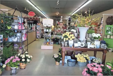  ??  ?? Numerous shopping and entertainm­ent options are available for everyone seeking the perfect Valentine’s Day experience to give to another.
ABOVE: Find flowers and gifts at Bussey’s Florist in Cedartown, who are well stocked for Valentine’s Day.