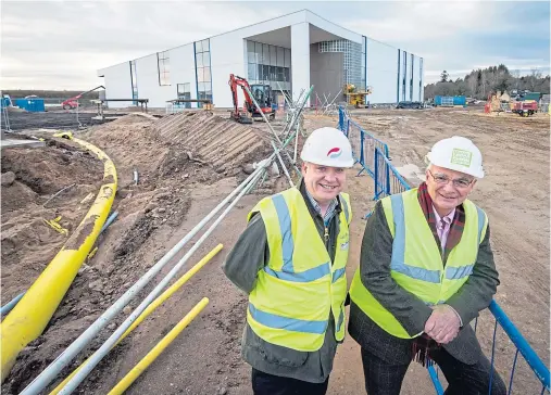  ?? Photograph by Jason Hedges ?? PRESSING FOR ACTION: MSP Richard Lochhead and Moray Sports Centre convener Sandy Adam.